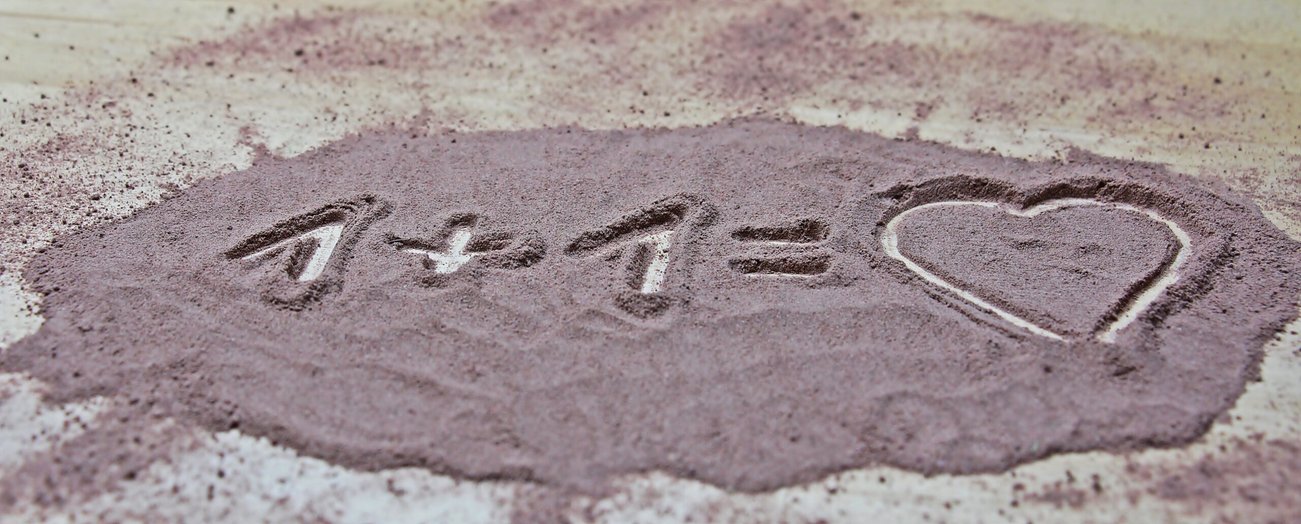 1 + 1 = Heart in Sand